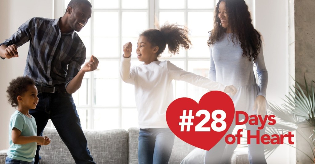 28 Days of Heart - African American family dancing in home